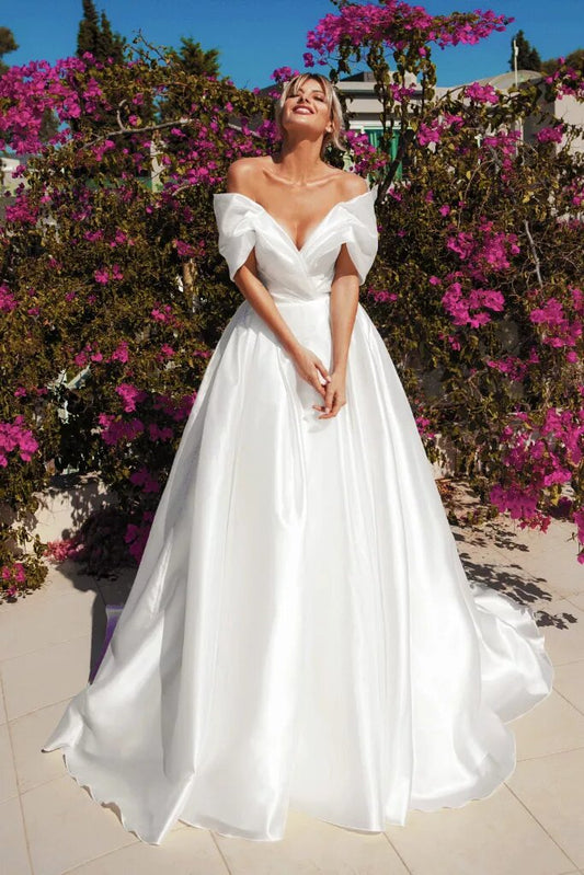 Majestic Ball Gown Wedding Dress with Off-the-Shoulder Neckline & Flattering Natural Waistline for a Regal Bridal Look