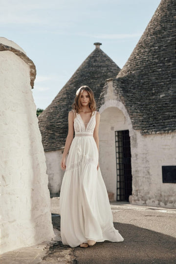 Ethereal Beach Wedding Dress with Long Sleeves, V-Neckline & Intricate Lace Details for a Graceful and Romantic Bridal Look