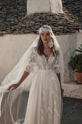 Romantic Beach Wedding Dress with Off-the-Shoulder V-Neckline, Intricate Lace Details & Flowing A-Line Silhouette for an Effortlessly Elegant Bridal Look