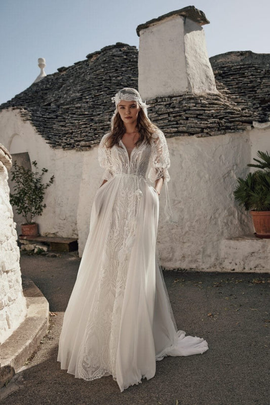 Romantic Beach Wedding Dress with Off-the-Shoulder V-Neckline, Intricate Lace Details & Flowing A-Line Silhouette for an Effortlessly Elegant Bridal Look - Camilla's