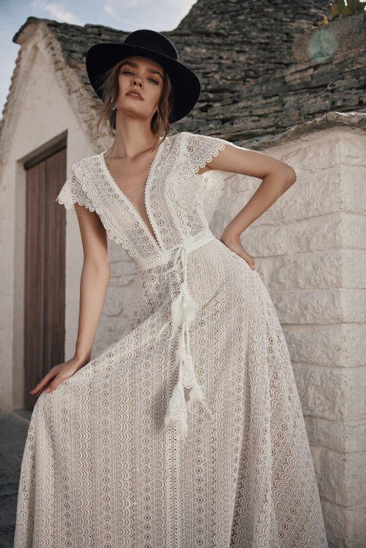 Ethereal Beach Wedding Dress with Off-the-Shoulder V-Neckline, Delicate Lace Details & Flowing A-Line Silhouette for a Romantic Bridal Look