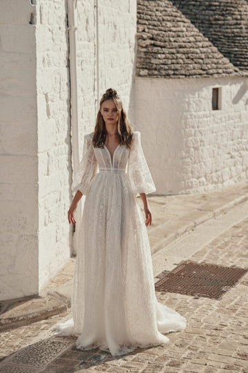 Graceful Beach Wedding Dress with Long Sleeves, V-Neckline & Delicate Lace for a Timeless and Romantic Bridal Look