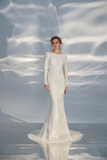 Sleek A-Line Wedding Gown with Long Sleeves, Boat Neckline, and a Natural Waistline for a Minimalist and Elegant Bridal Look