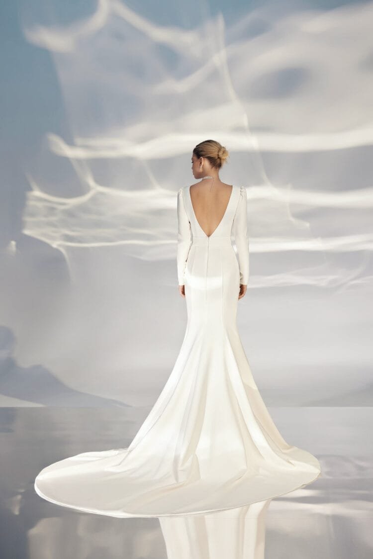 Sophisticated A-Line Wedding Gown with Long Sleeves, V-Neckline, and a Natural Waistline for a Modern and Elegant Bridal Look