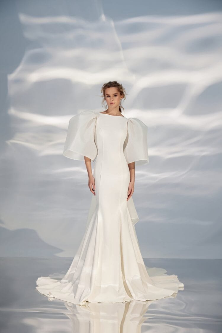 Contemporary Off-Shoulder A-Line Wedding Gown with Boat Neckline and a Natural Waistline for a Sophisticated Bridal Look