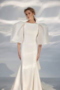 Contemporary Off-Shoulder A-Line Wedding Gown with Boat Neckline and a Natural Waistline for a Sophisticated Bridal Look