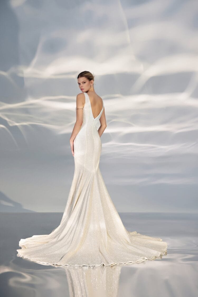 Sleek Strapless A-Line Wedding Gown with Boat Neckline and a Natural Waistline for a Chic Minimalist Bridal Look