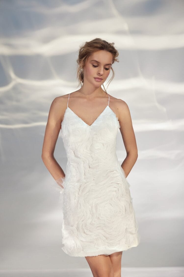 Sophisticated Strapless Sheath Wedding Gown with V-Neckline, Delicate Lace Embellishment, and a Natural Waistline for a Modern Bridal Look