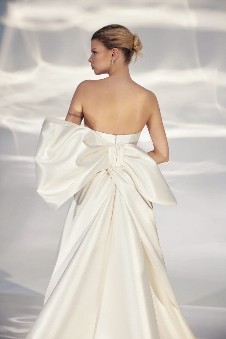 Enchanting Strapless A-Line Wedding Gown with Sweetheart Neckline, Bant Embellishment, and a Natural Waistline for a Romantic Bridal Look