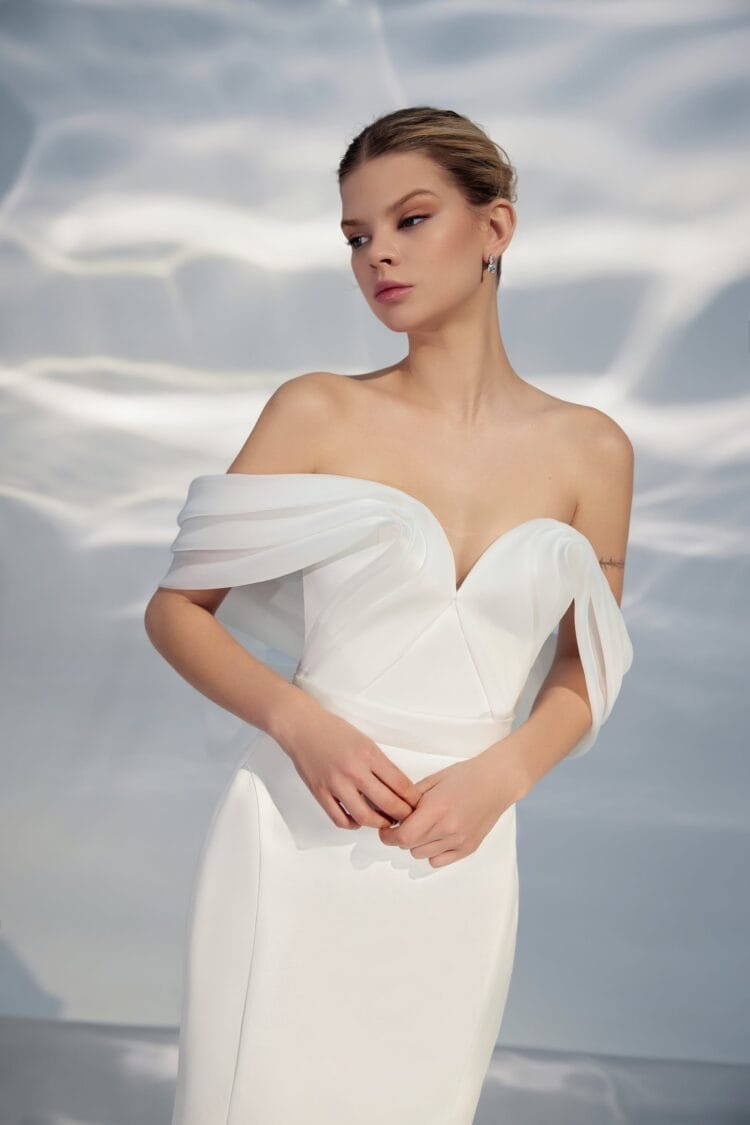 Ethereal Off-Shoulder A-Line Wedding Gown with Sweetheart Neckline, Bant Embellishment, and a Natural Waistline for a Breathtaking Bridal Look