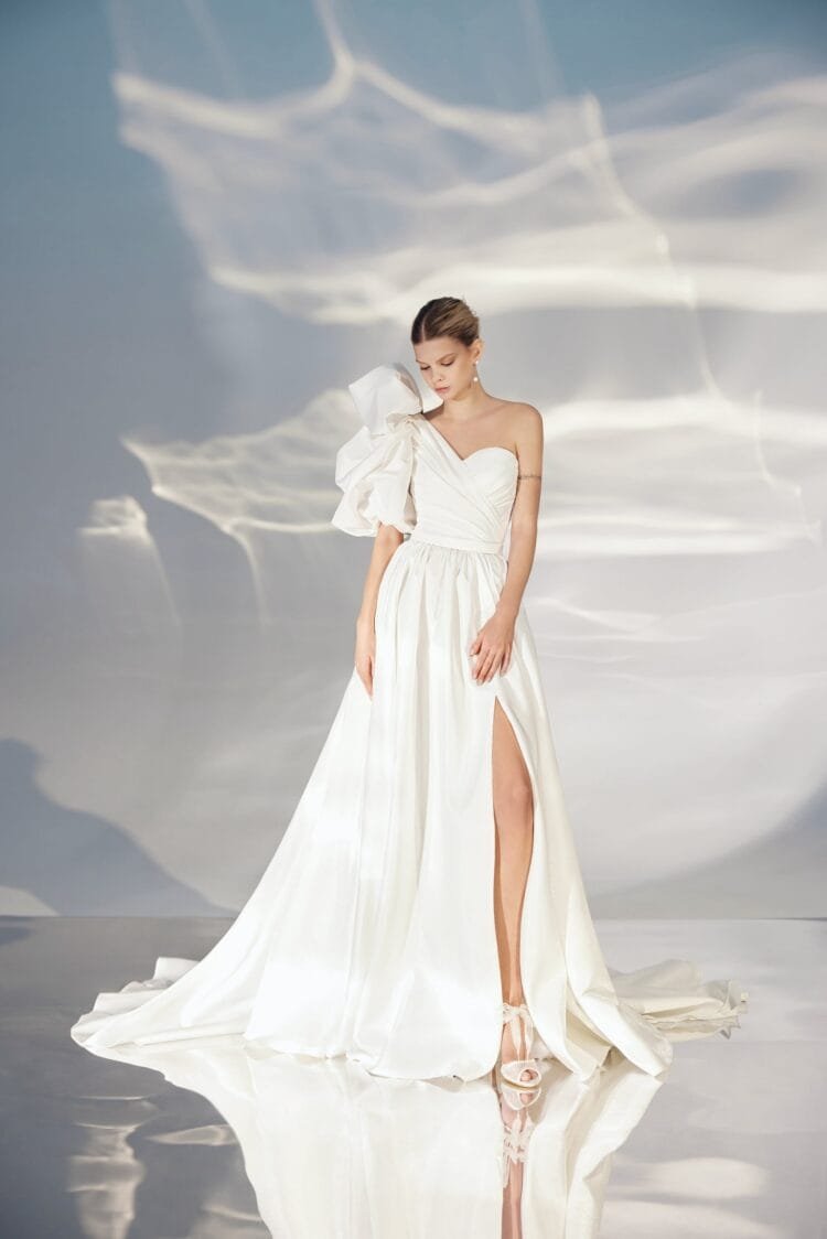 Timeless Off-Shoulder Sheath Wedding Gown with Strapless Neckline, Bant Embellishment, and Natural Waistline for a Stunning Bridal Look