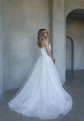 Beautiful A-Line Puffy Wedding Gown with Strapless Design and Boat Neckline for a Stunning Look