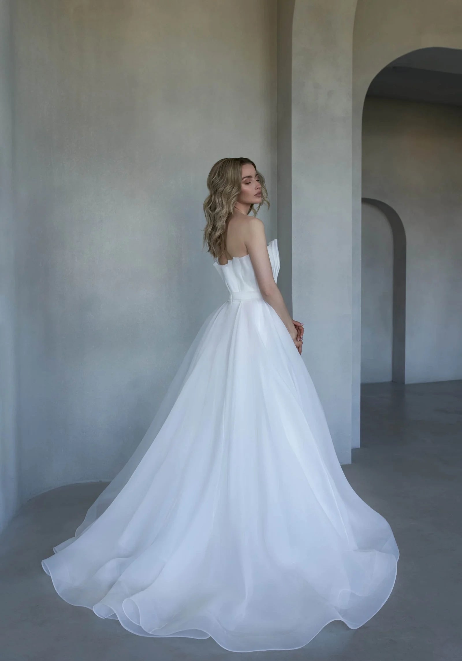 Beautiful A-Line Puffy Wedding Gown with Strapless Design and Boat Neckline for a Stunning Look