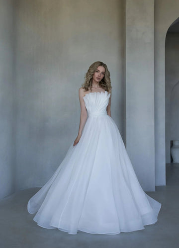 Beautiful A-Line Puffy Wedding Gown with Strapless Design and Boat Neckline for a Stunning Look