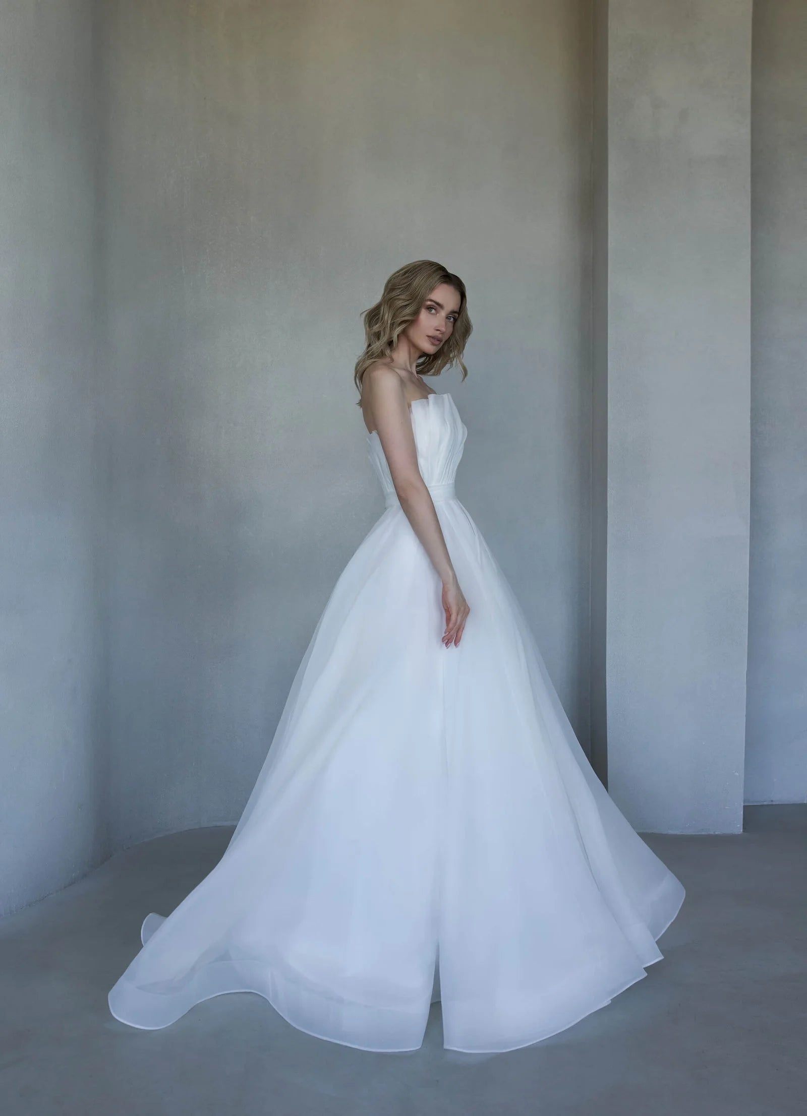 Beautiful A-Line Puffy Wedding Gown with Strapless Design and Boat Neckline for a Stunning Look