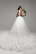 Beautiful Puffy A-Line Wedding Dress with Straps, V-Neckline, and Lace Embellishments for a Stunning Bridal Look