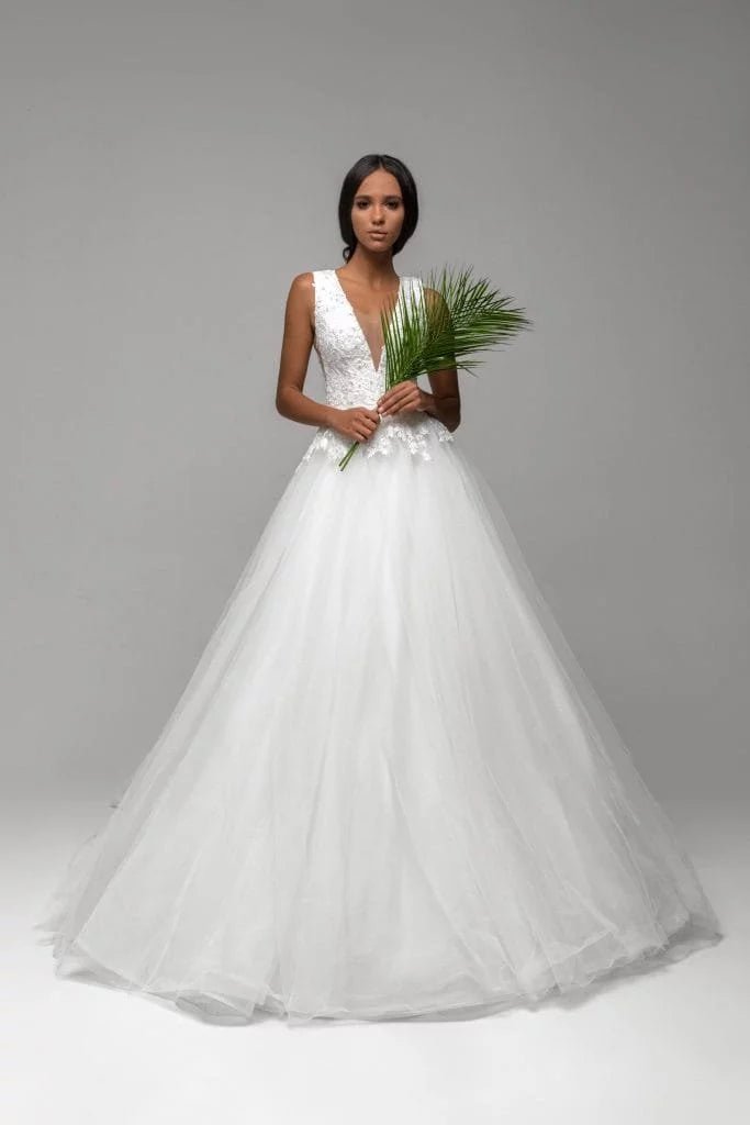 Beautiful Puffy A-Line Wedding Dress with Straps, V-Neckline, and Lace Embellishments for a Stunning Bridal Look