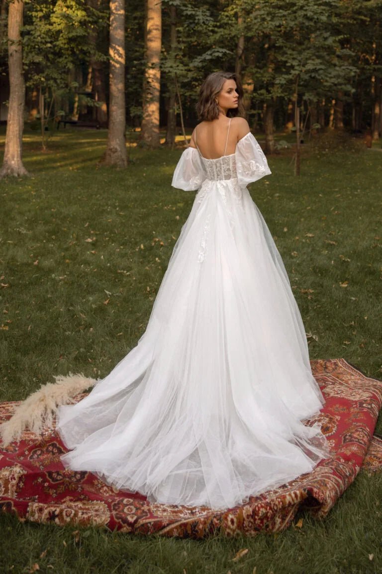 Dreamy Puffy A-Line Wedding Dress with Spaghetti Straps, Sweetheart Neckline, and Elegant Pearl Embellishments