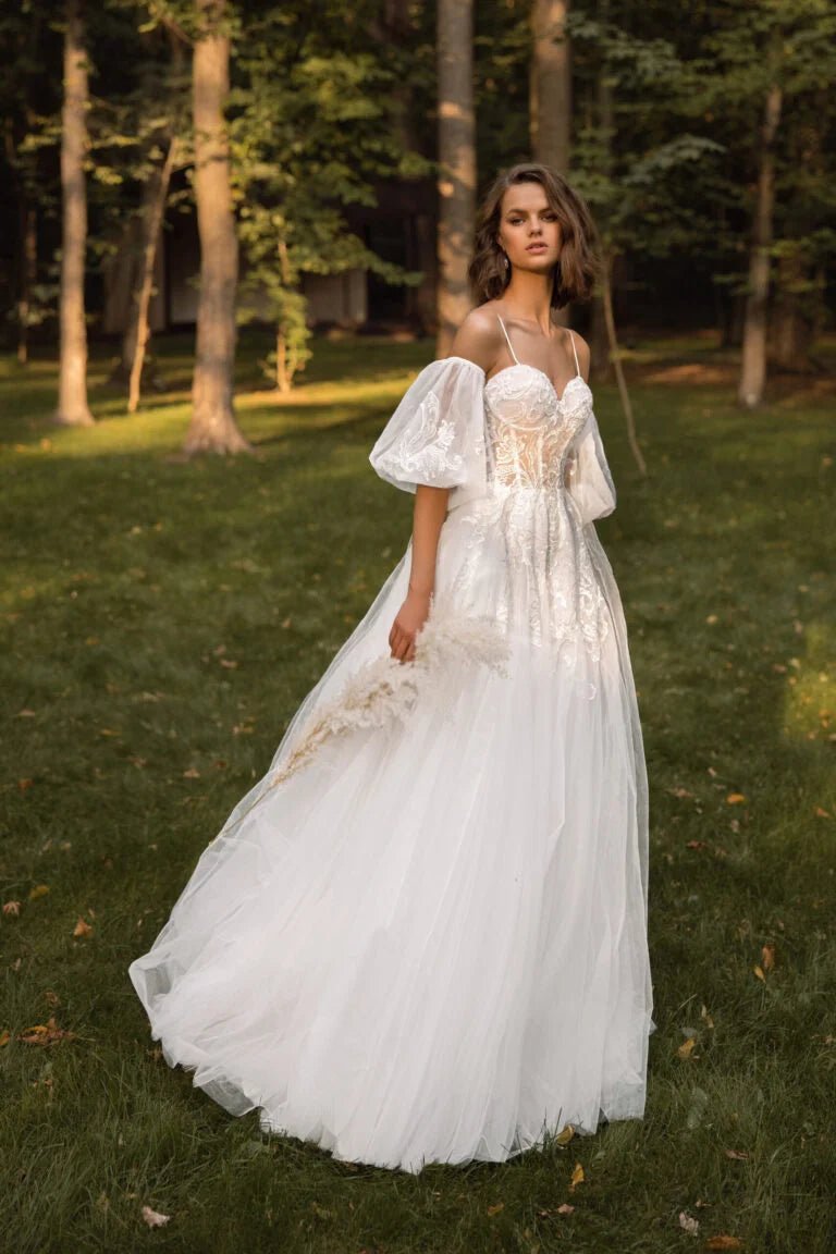 Dreamy Puffy A-Line Wedding Dress with Spaghetti Straps, Sweetheart Neckline, and Elegant Pearl Embellishments