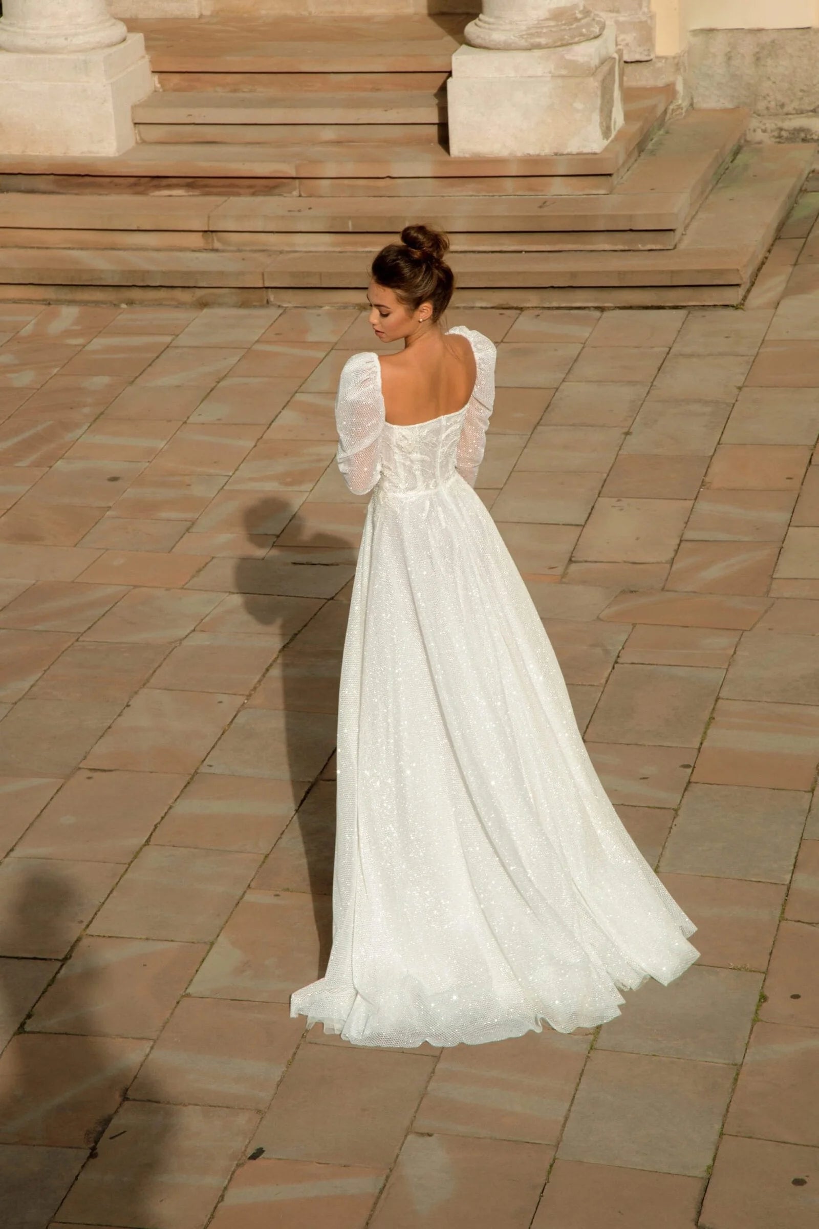 Elegant A-Line Puffy Bridal Gown with Long Sleeves, Boat Neckline, and Exquisite Lace Embellishments