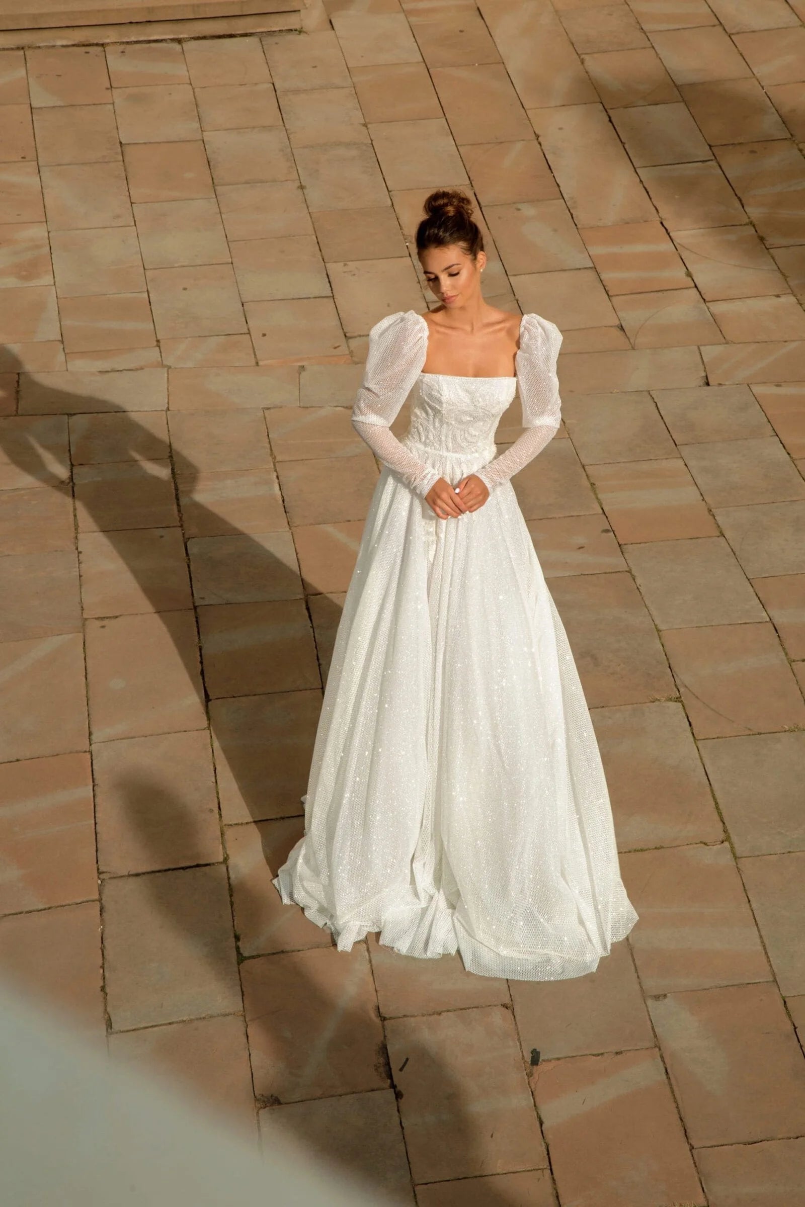 Elegant A-Line Puffy Bridal Gown with Long Sleeves, Boat Neckline, and Exquisite Lace Embellishments