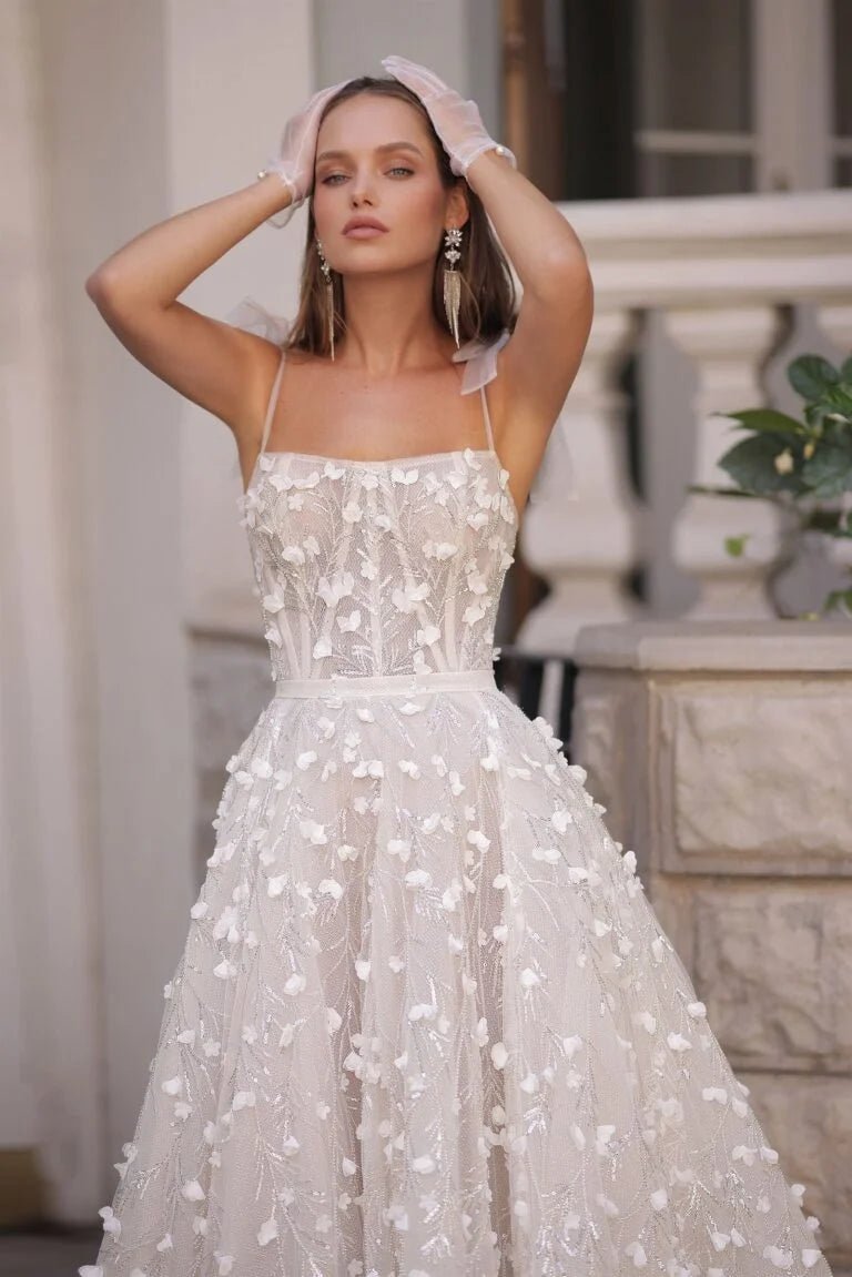 Elegant A-Line Wedding Gown with a Voluminous Skirt, Delicate Straps, Boat Neckline, and Exquisite Lace Embellishments – Romantic Bridal Dress