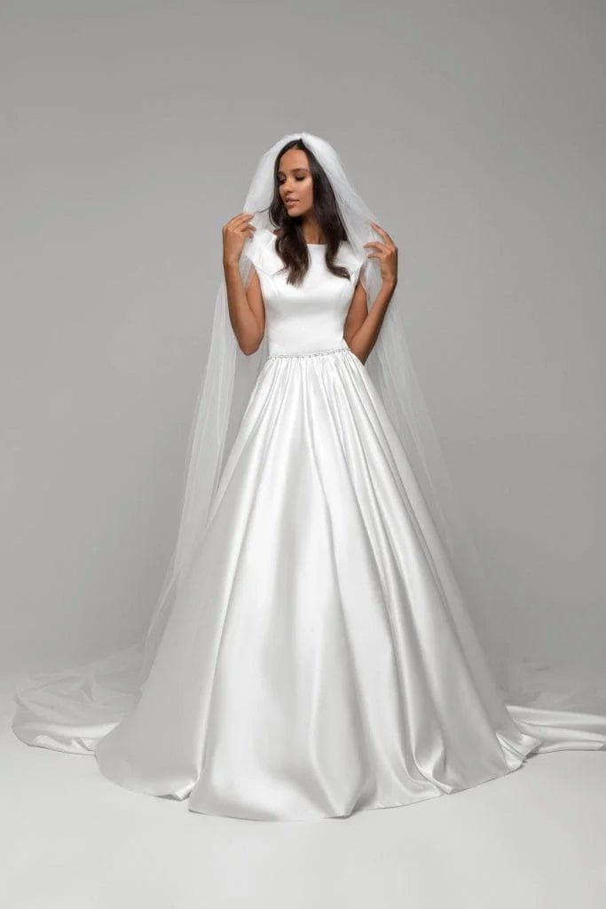 Elegant A-Line Wedding Gown with Cap Sleeves, Boat Neckline, and Lace Embellishments for a Classic Bridal Look