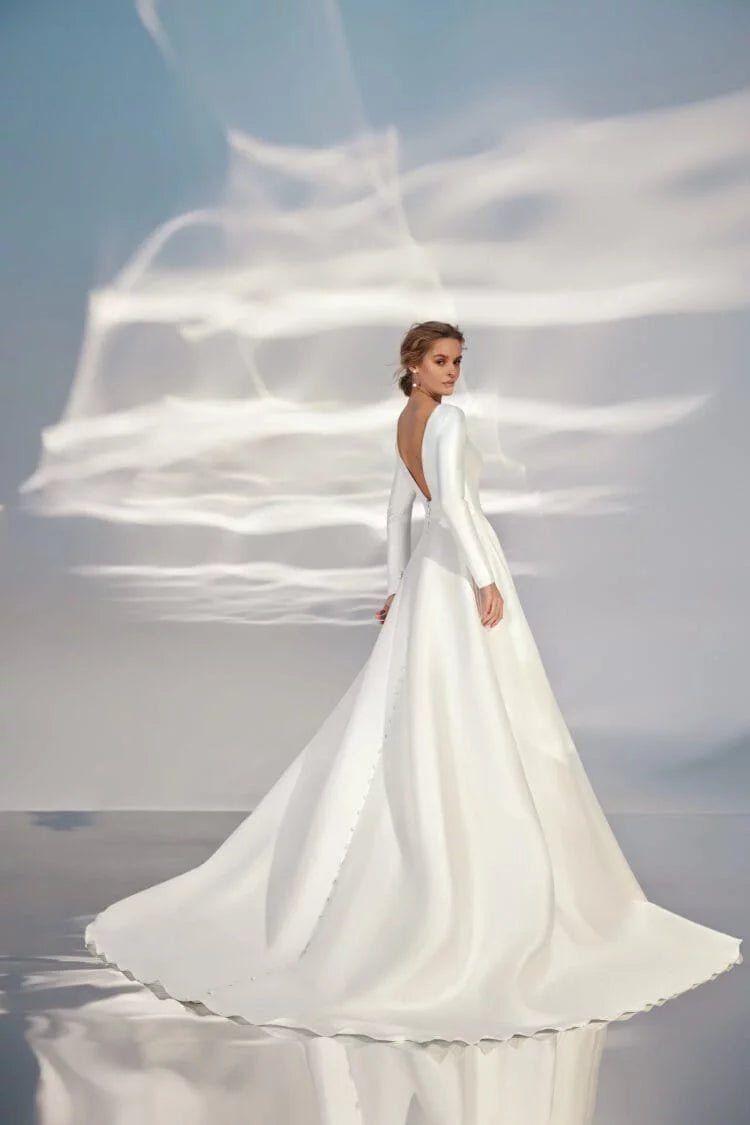 Elegant A-Line Wedding Gown with Long Sleeves, High Neckline, and a Flattering Natural Waistline – Minimalist Bridal Dress