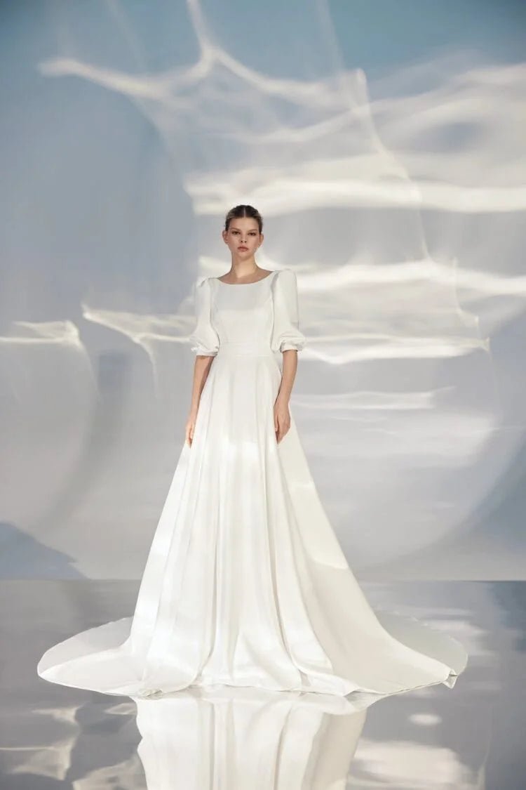 Elegant A-Line Wedding Gown with Puff Sleeves, Boat Neckline, and a Flattering Natural Waistline – Romantic Bridal Dress