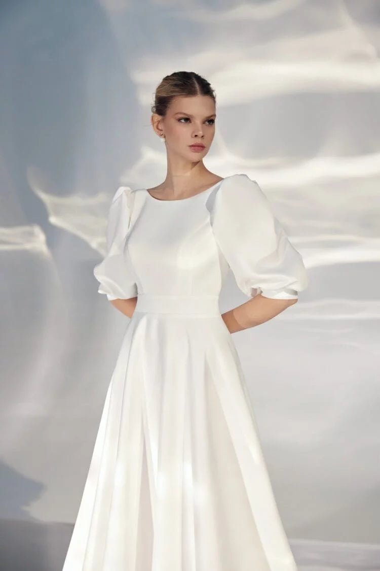 Elegant A-Line Wedding Gown with Puff Sleeves, Boat Neckline, and a Flattering Natural Waistline – Romantic Bridal Dress