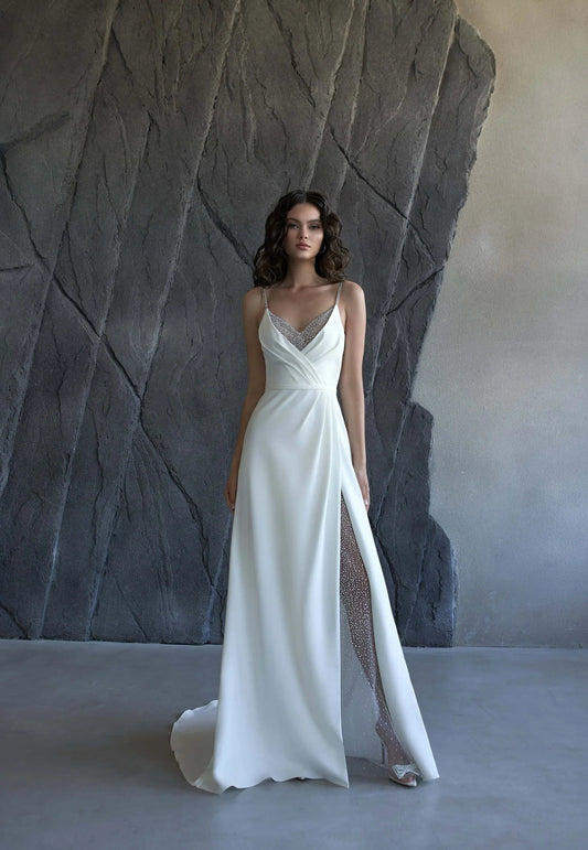 Elegant Minimalist A-Line Wedding Dress with Sweetheart Neckline, Delicate Straps, and Beautiful Lace Embellishments