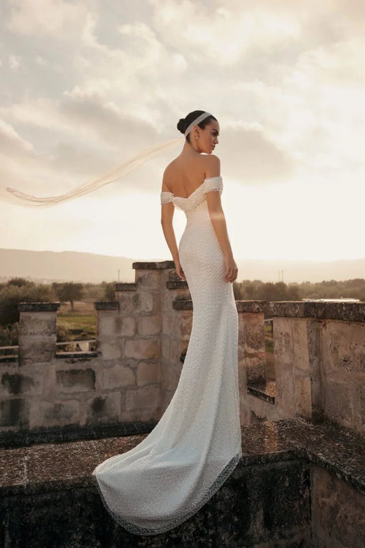 Elegant Minimalist Sheath Wedding Dress with Strapless Off-Shoulder Neckline, Glitter Embellishments, and Natural Waistline for a Stunning Bridal Look - Camilla's