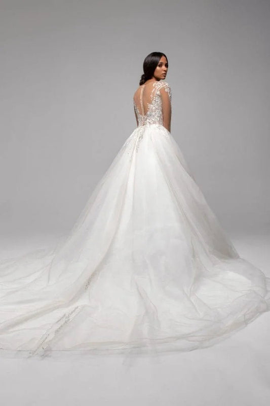 Elegant Puffy A-Line Wedding Gown with Long Sleeves, V-Neckline, and Lace Embellishments for a Graceful Bridal Look