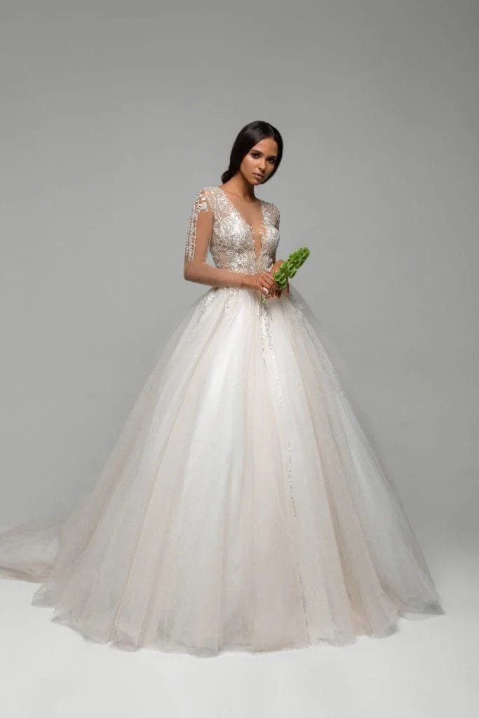 Elegant Puffy A-Line Wedding Gown with Long Sleeves, V-Neckline, and Lace Embellishments for a Graceful Bridal Look