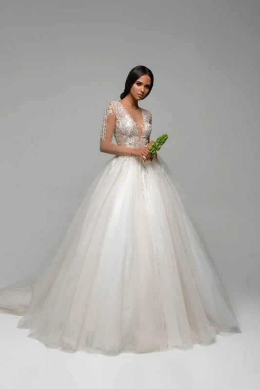 Elegant Puffy A-Line Wedding Gown with Long Sleeves, V-Neckline, and Lace Embellishments for a Graceful Bridal Look