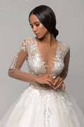 Elegant Puffy A-Line Wedding Gown with Long Sleeves, V-Neckline, and Lace Embellishments for a Graceful Bridal Look