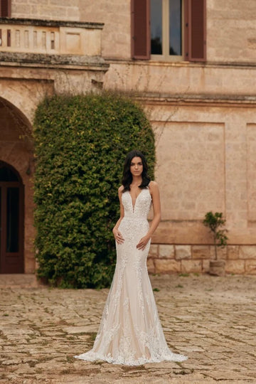 Elegant Sheath Wedding Dress with Strapless V-Neckline, and Natural Waistline for a Stunning Bridal Look