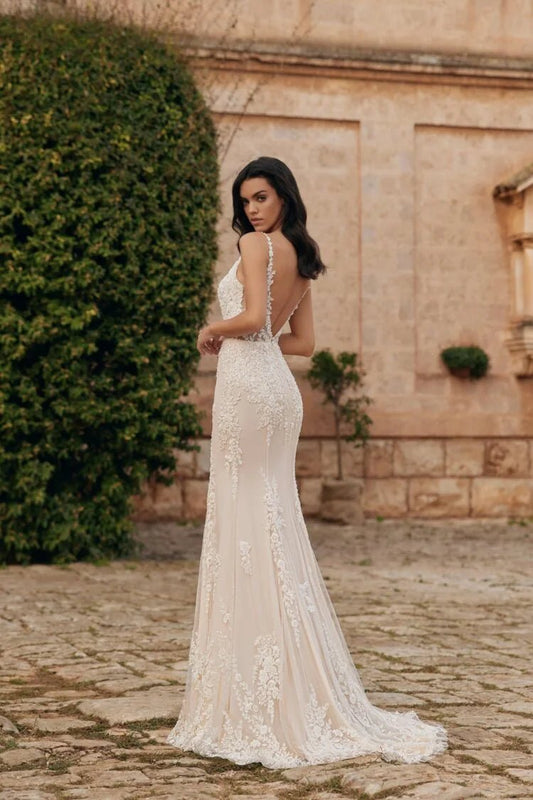 Elegant Sheath Wedding Dress with Strapless V-Neckline, and Natural Waistline for a Stunning Bridal Look