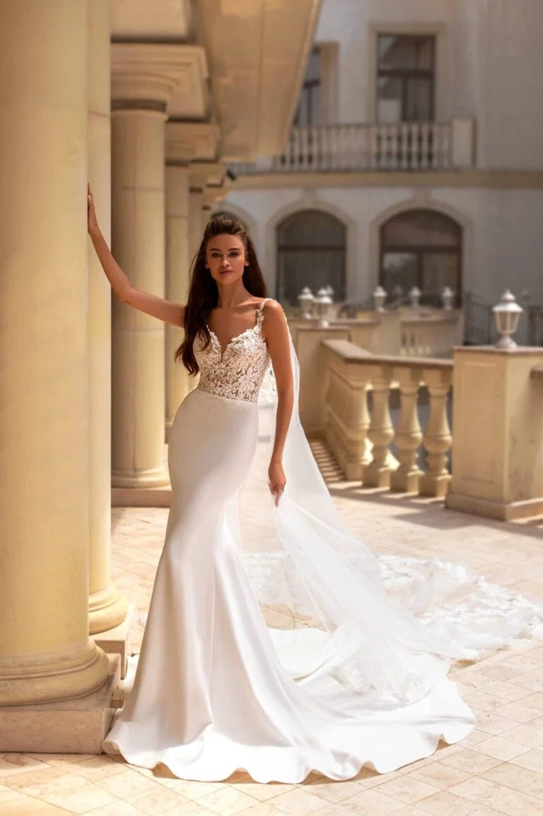 Glamorous Mermaid Wedding Gown with Straps, V-Neckline, and a Flattering Natural Waist for a Dazzling Bridal Look