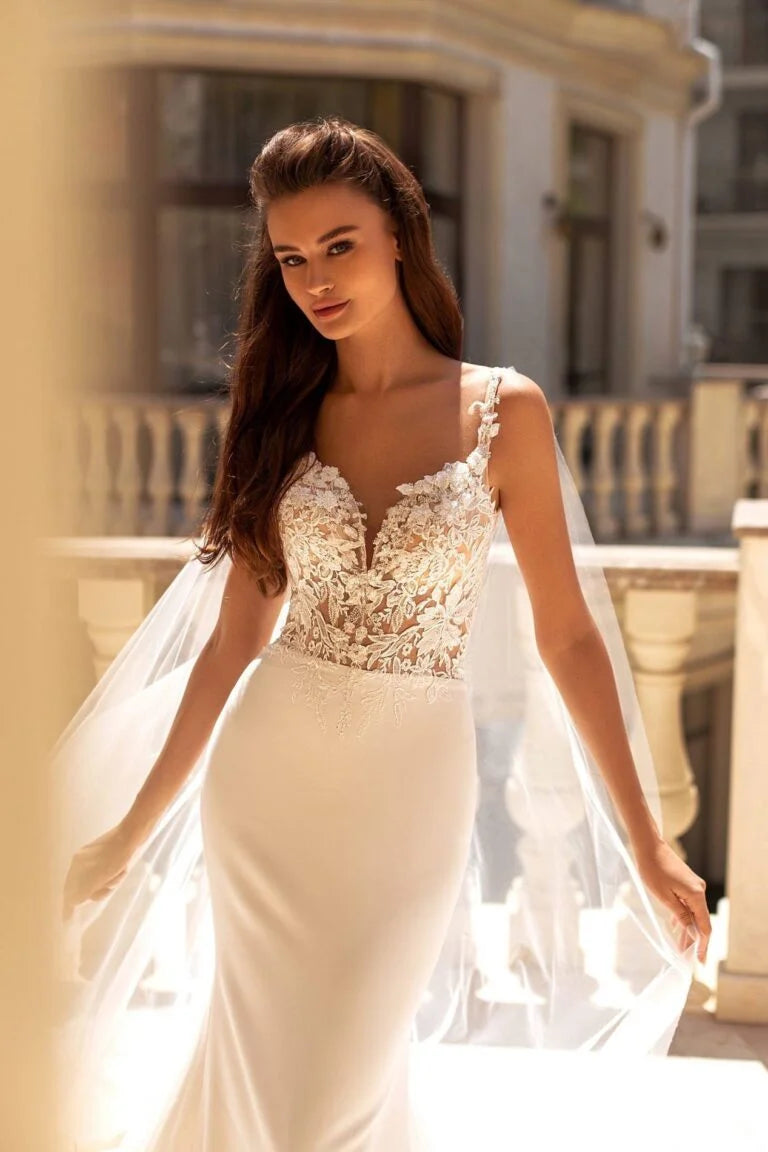 Glamorous Mermaid Wedding Gown with Straps, V-Neckline, and a Flattering Natural Waist for a Dazzling Bridal Look