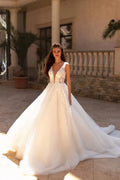 Majestic Ball Gown Wedding Dress with Cap Sleeves, V-Neckline, and a Flattering Dropped Waist for a Fairytale Bridal Look