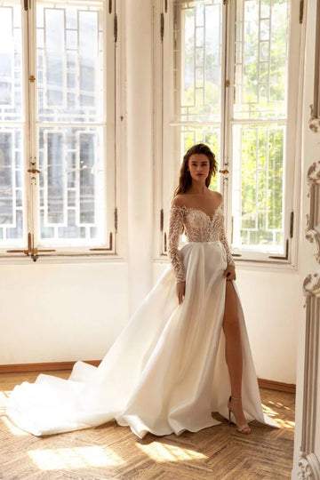 Romantic A-Line Wedding Gown with Long Sleeves, Off-Shoulder Neckline, and a Flattering Dropped Waist for a Timeless Bridal Look