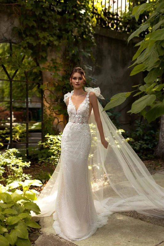 Exquisite Mermaid Wedding Gown with Spaghetti Straps, V-Neckline, and a Flattering Natural Waist for a Glamorous Bridal Look