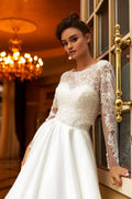 Graceful A-Line Wedding Gown with Long Sleeves, High-Neckline, and a Flattering Dropped Waist for a Timeless and Elegant Bridal Look