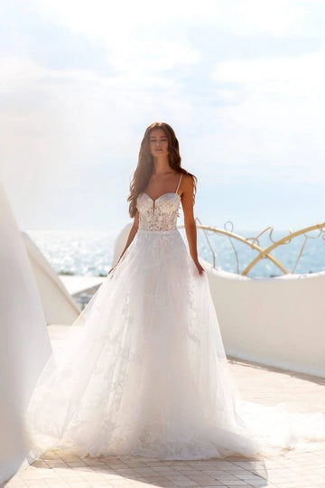 Romantic A-Line Wedding Gown with Straps, Sweetheart Neckline, and a Flattering Dropped Waist for an Enchanting Bridal Look