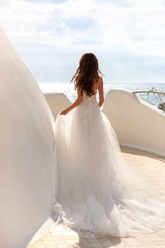 Romantic A-Line Wedding Gown with Straps, Sweetheart Neckline, and a Flattering Dropped Waist for an Enchanting Bridal Look