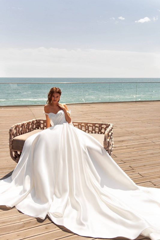 Enchanting Ball Gown Wedding Dress with Off-Shoulder Sweetheart Neckline, Delicate Lace Details, and a Flattering Dropped Waist for a Fairytale Bridal Look