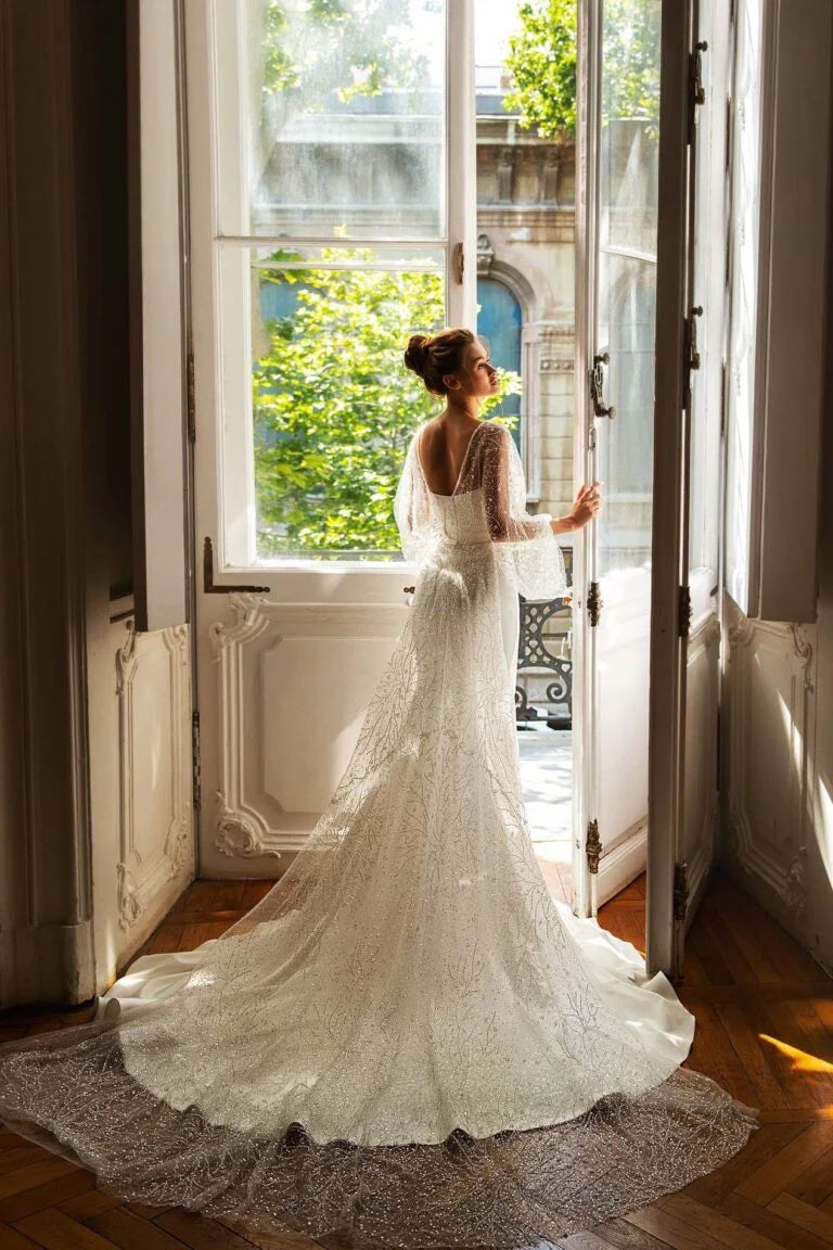 Stunning Mermaid Wedding Gown with Long Sleeves, V-Neckline, and a Flattering Natural Waist for an Elegant Bridal Look