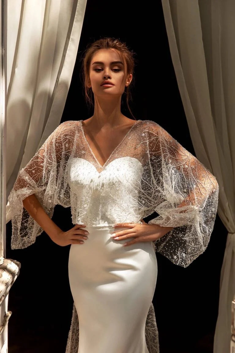 Stunning Mermaid Wedding Gown with Long Sleeves, V-Neckline, and a Flattering Natural Waist for an Elegant Bridal Look