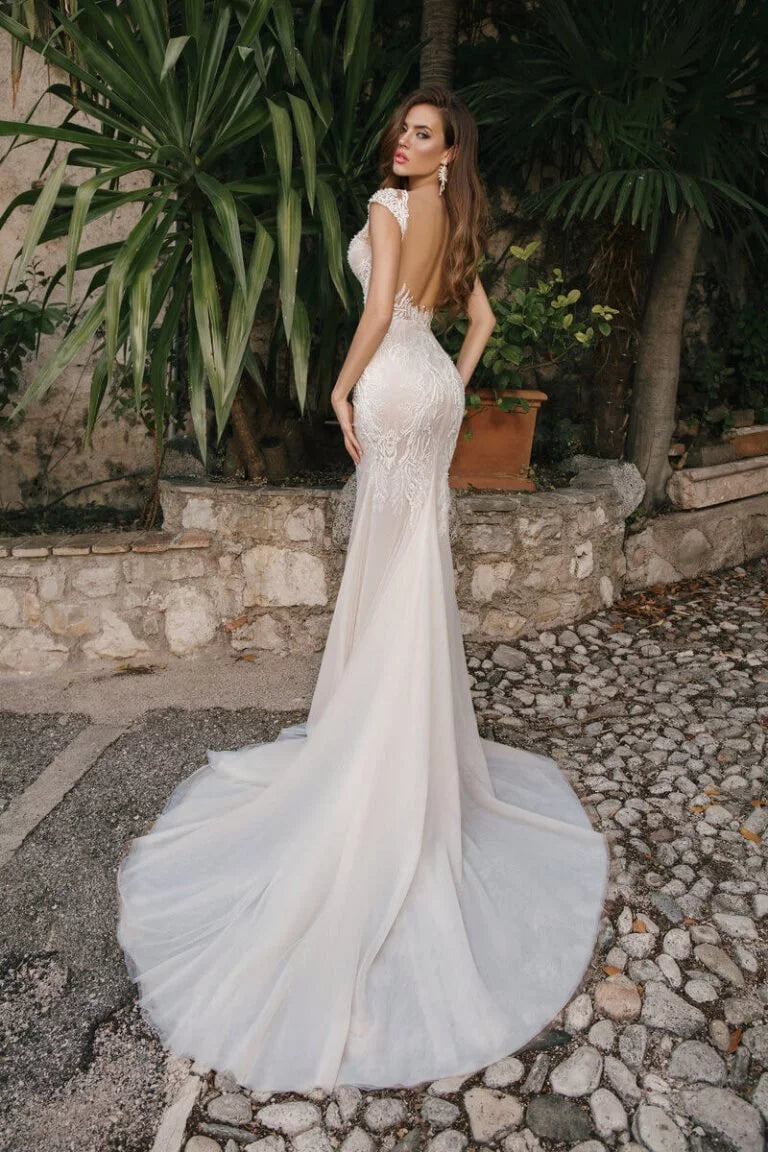 Sophisticated Mermaid Wedding Dress with Cap Sleeves, Queen Anne Neckline, and a Flattering Natural Waistline for an Elegant Bridal Look